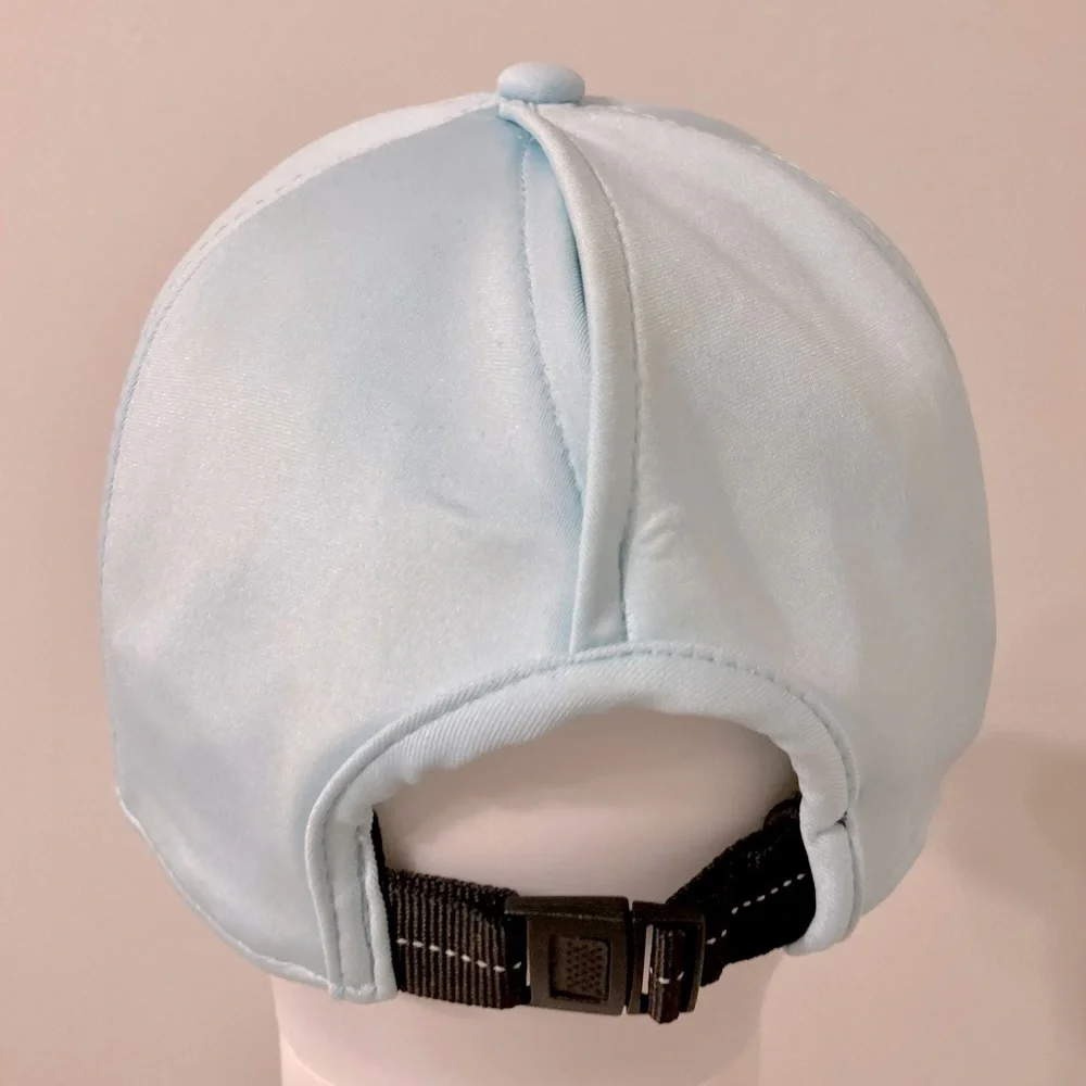 light blue baseball cap with reflective stripe on the peak self-adjusting .